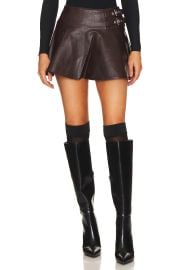 Weworewhat Faux Leather Buckle Mini Skort In Dark Patina Black Sherpa at Revolve