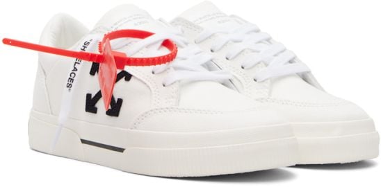 White Vulcanized Low Canvas Sneakers at ssense