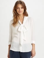 White blouse by Alice and Olivia at Saks Fifth Avenue