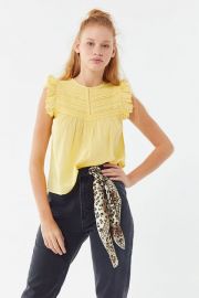 Willa Sleeveless Ruffle Babydoll Top by Urban Outfitters at Urban Outfitters