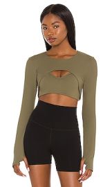 YEAR OF OURS Active Shrug in Olive at Revolve