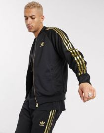 adidas Originals Superstar 24K jacket in black and gold at ASOS