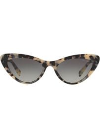 cat eye sunglasses at Farfetch