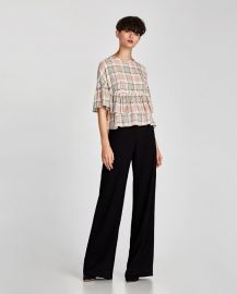 checked top with metal eyelets at Zara