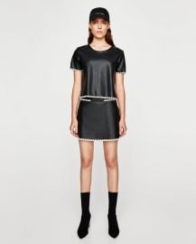 contrasting faux leather mini skirt at Zara