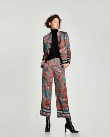 flowing jacket with grommets at Zara