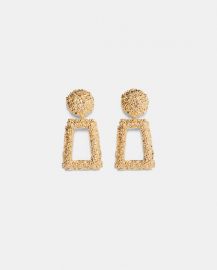 golden raised design earrings at Zara