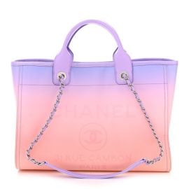 https://www.fashionphile.com/p/chanel-shaded-calfskin-medium-deauville-tote-pink-purple-coral-1493553 at Fashionphile