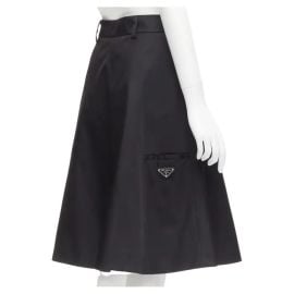 new PRADA 2019 black triangle logo seal plaque A-line flared skirt IT38 XS at 1st Dibs