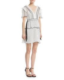 WornOnTV: Erin’s white polka dot ruffle dress on E! News | Erin Lim ...