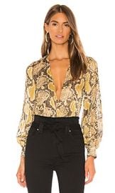 superdown Aliza Bodysuit in Natural Snake at Revolve