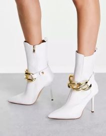 with chain detail by Simmi London Heeled Ankle Boots with Chain Detail at ASOS