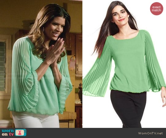 Alfani Pleat-Sleeve Blouson Top worn by Xiomara Villanueva (Andrea Navedo) on Jane the Virgin