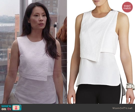 Bcbgmaxazria Alyssa Asymmetrical Overlay Top worn by Joan Watson on Elementary