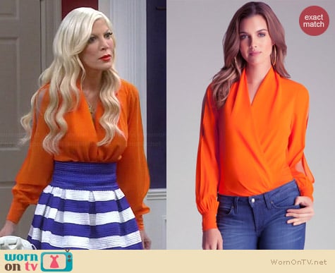 Bebe Long Sleeve Wrap Bodysuit in Flame worn by Tori Spelling on Mystery Girls