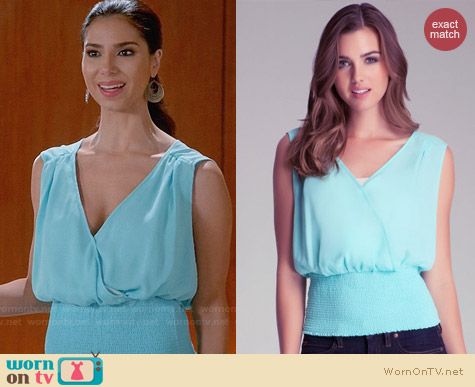 Bebe Smocked Sleeveless Surplice Top worn by Roselyn Sanchez on Devious Maids