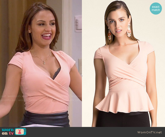 Bebe Solid Peplum Top worn by Sofia Rodriguez (Aimee Carrero) on Young and Hungry