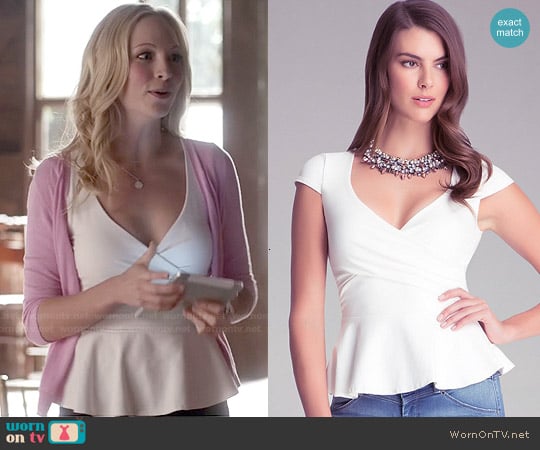 Bebe Solid Wrap Peplum Top in White worn by Caroline Forbes (Candice Accola) on The Vampire Diaries