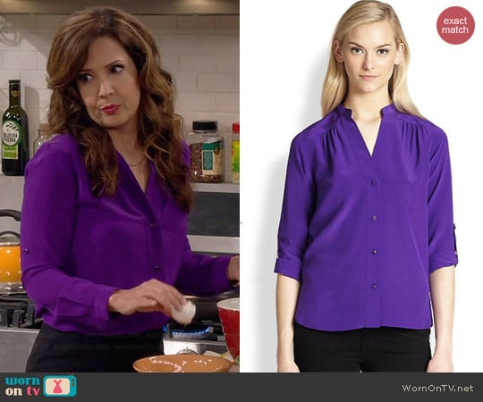 Diane von Furstenberg Harlow Blouse in Acid Grape worn by Maria Canals-Barrera on Cristela