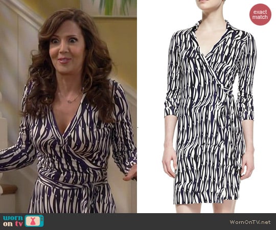 Diane von Furstenberg Jeanne Wrap Dress in Glass Weave Purple worn by Maria Canals-Barrera on Cristela