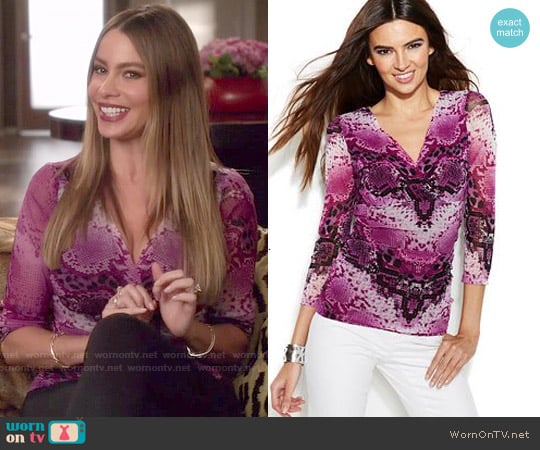 INC International Concepts Snakeskin-Print Surplice Top worn by  Gloria Pritchett (Sofia Vergara) on Modern Family