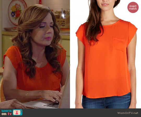 Joie Rancher Top in Spicy Orange worn by Maria Canals-Barrera on Cristela