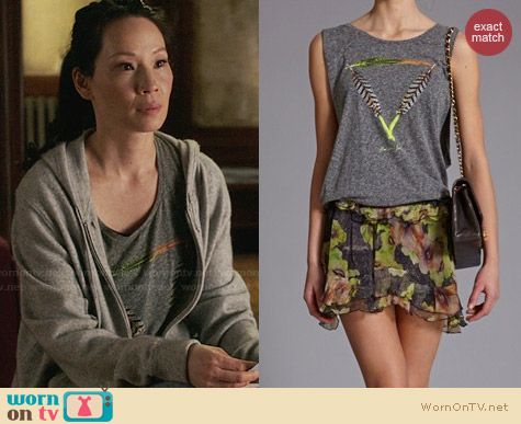 Maison Scotch Feather Print Sleeveless Shirt worn by Lucy Liu on Elementary