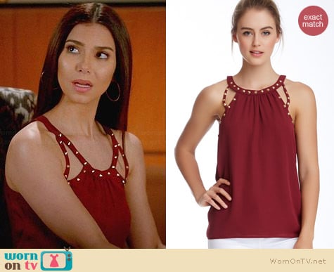 Socialite Studded Cutout Tank worn by Roselyn Sanchez on Devious Maids