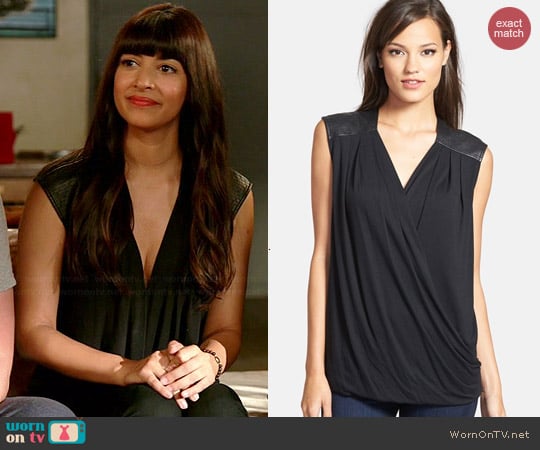 Trouve Faux Leather Wrap Top worn by Hannah Simone on New Girl