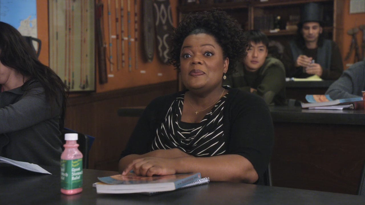 Shirley's black and white striped cowneck top on Community