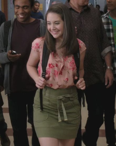 Annie's pink blouse with green skirt