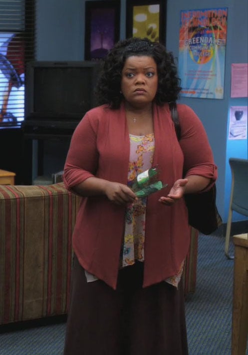 Shirley's brown maxi skirt and open cardigan on Community