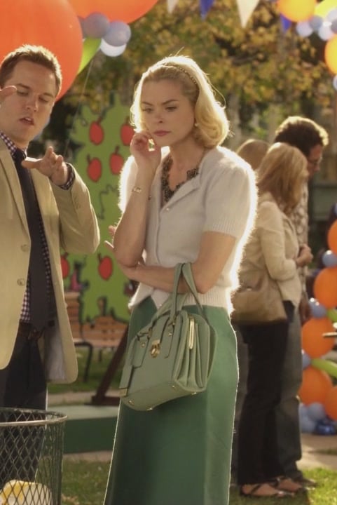 Lemon's white fluffy cardigan and green handbag on Hart of Dixie