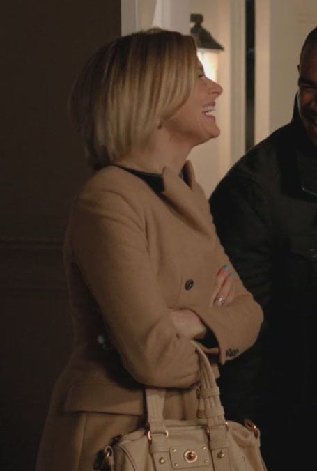 Jane's beige coat and handbag on Happy Endings