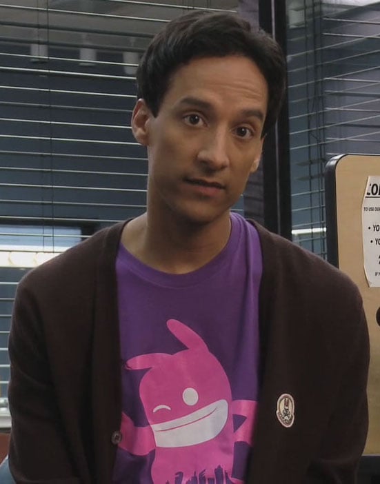 Abed's purple shirt with pink character on it on Community