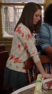 Annie's cream and orange floral cardigan on Community