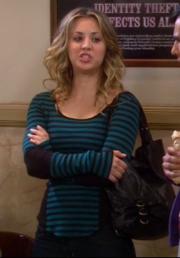Penny's blue striped longsleeve top and black handbag on The Big Bang Theory