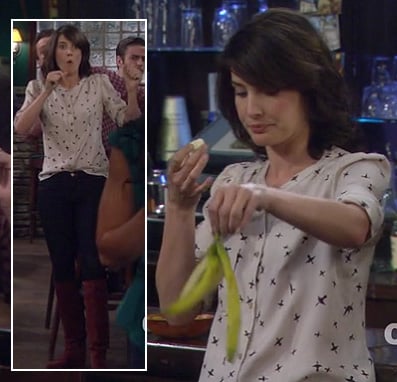 Robin's white bird print blouse with red boots on How I Met Your Mother