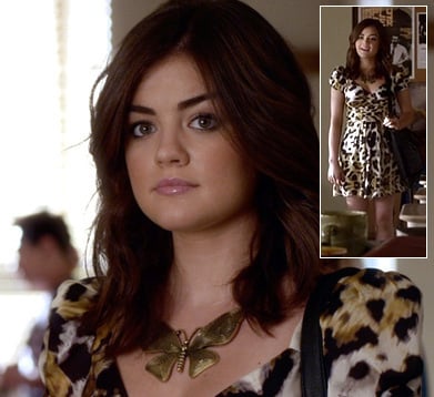 Aria's big gold butterfly necklace and leopard print dress on Pretty Little Liars