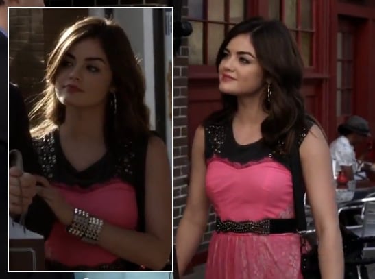 Aria's pink and black dress with silver spiked bangles on Pretty Little Liars