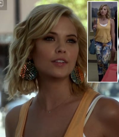 Hanna's peach tank top, floral jeans and circle earrings on Pretty Little Liars