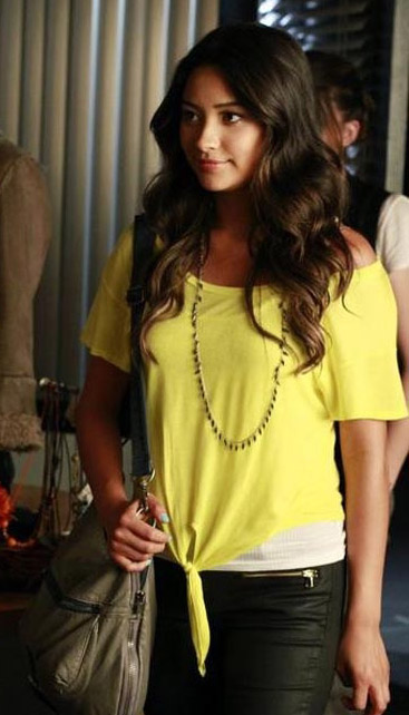 Emily's yellow tie front top and black pants on Pretty Little Liars