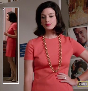 Megan's coral dress and gold chain necklace on Mad Men