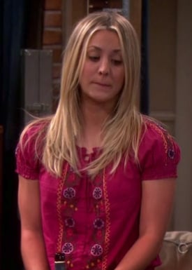 Penny's red peasant style top on Big Bang Theory