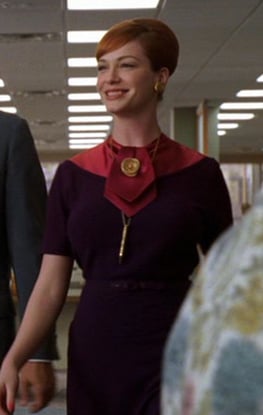 Joan's purple dress with pink tie on Mad Men