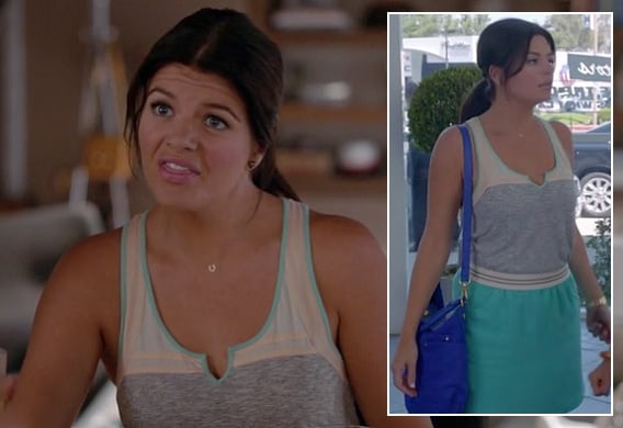 Penny's blue bag with turquoise skirt and tank top on Happy Endings