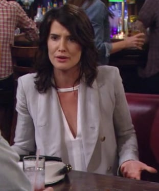 Robin's white cutout blouse and light grey blazer on How I Met Your Mother