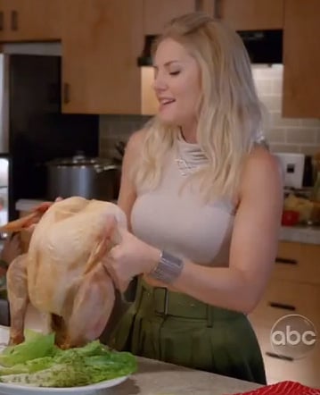 Alex's green skirt and cream cropped turtleneck top on Happy Endings