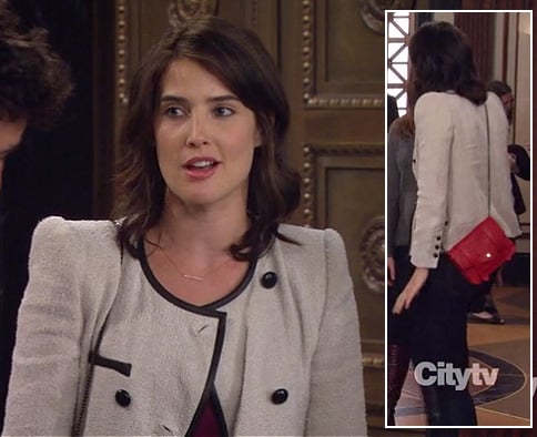 Robin's cream double breasted blazer with black trim and red purse on How I Met Your Mother