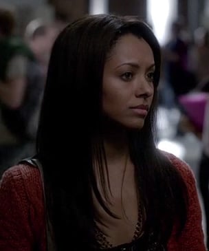 Bonnie's orange cable knit cardigan on The Vampire Diaries